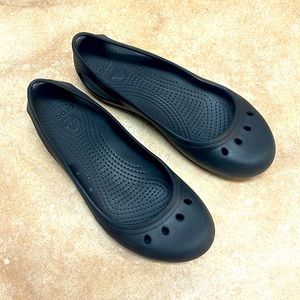 Black flats by crocs